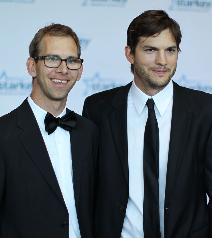 Michael and Ashton Kutcher in suits and ties